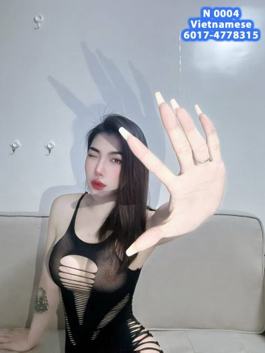 Beautiful Asian massage therapist in black lingerie offering premium B2B massage services in Kuala Lumpur